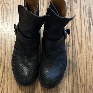 Fiorentini and Baker black leather motorcycle boots.